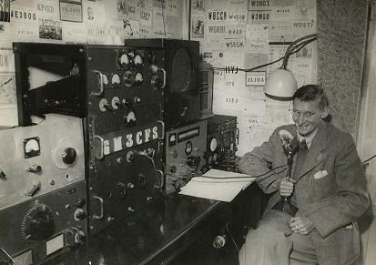 Photograph of Jim GM3CFS in his shack.