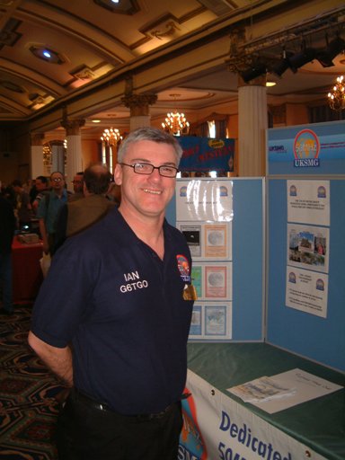 Photograph of Ian G6TGO and part of the UKMSG stand at the NARSA Norbreck Rally in April 2010