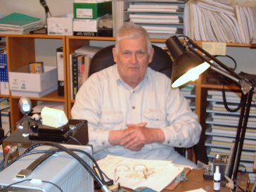 Photograph of Frans ON4LR in his shack.